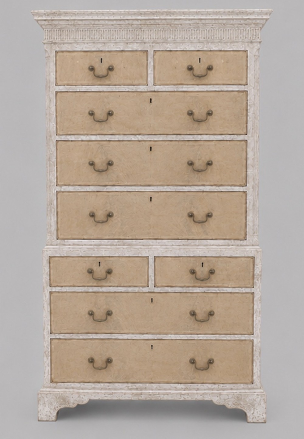 A George III chest on chest featuring a painted off-white frame, light tan drawer fronts, brass drop handles, and bracket feet. View II