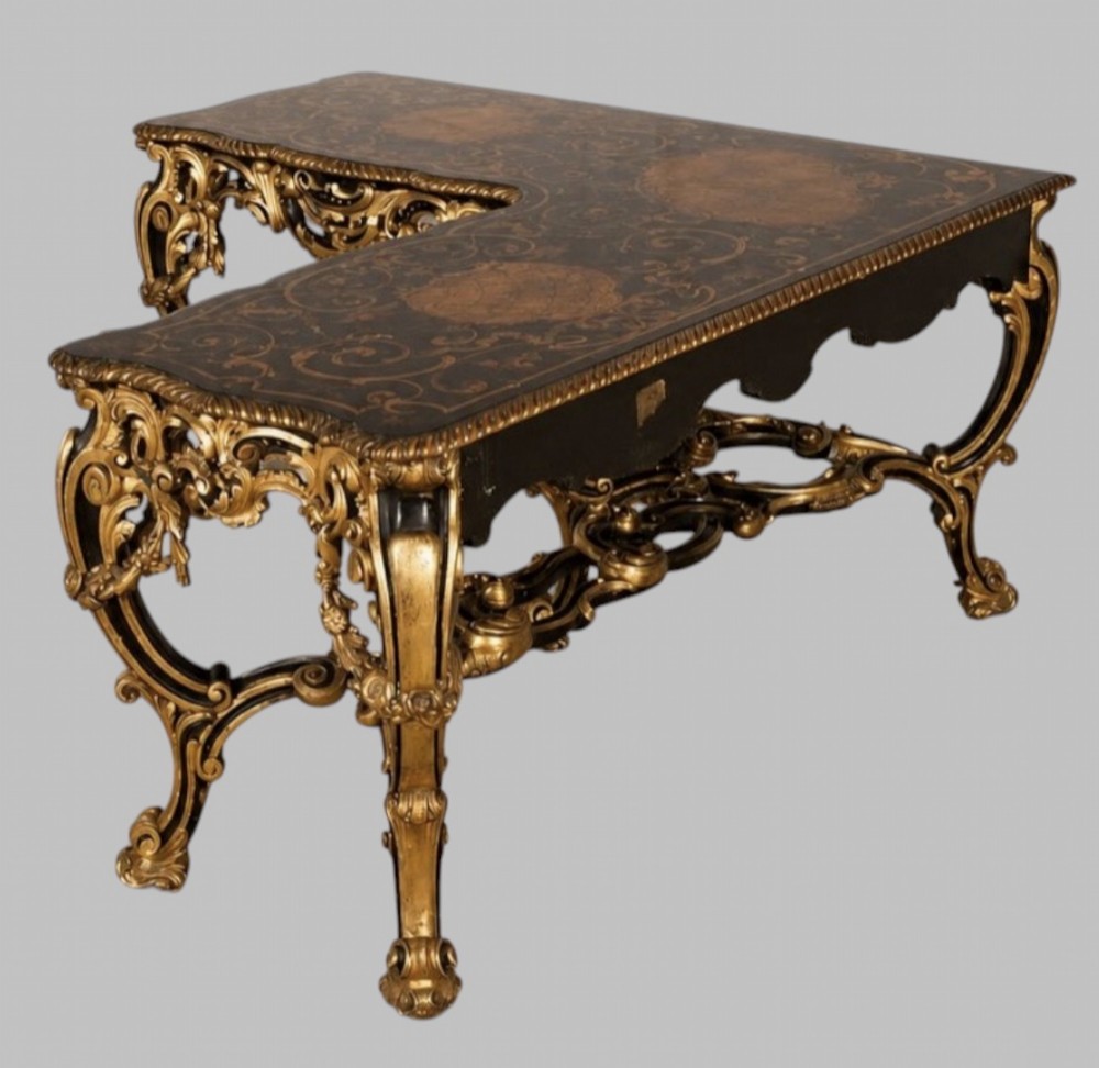 An L-shaped 19th-century Italian corner console table with elaborate gilded carvings, cabriole legs, and a detailed patterned top. View II