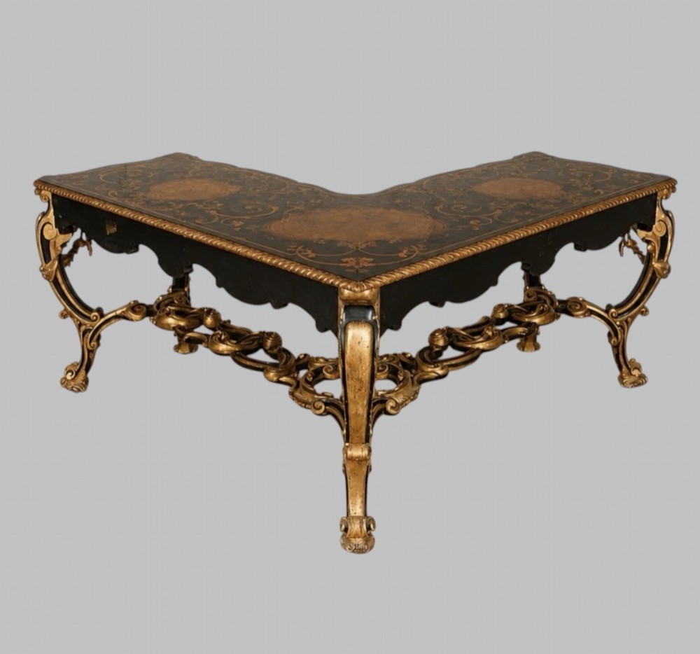 An L-shaped 19th-century Italian corner console table with elaborate gilded carvings, cabriole legs, and a detailed patterned top. View III