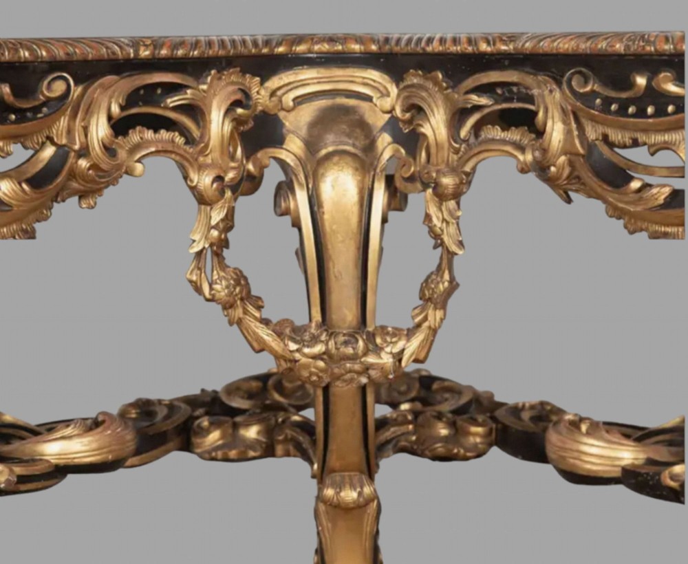 An L-shaped 19th-century Italian corner console table with elaborate gilded carvings, cabriole legs, and a detailed patterned top. View IV