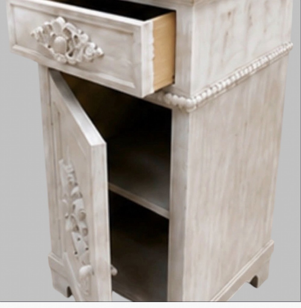 A pair of French off-white painted bedside cabinets featuring fitted marble tops, single drawers, and cupboard doors with central carved foliate relief motifs. View VI