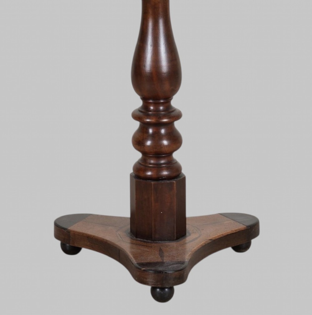 A Georgian tilt-top games table with a square geometric inlaid chessboard top mounted on a turned pedestal column and triform base with ball feet. View IV