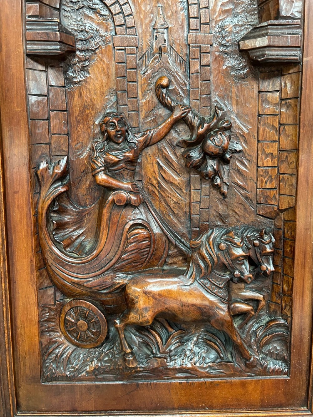 A late 19th-century French Provincial walnut dresser featuring hand-carved relief panels, glazed side cabinets, turned support columns, and a green marble insert surface. View VII