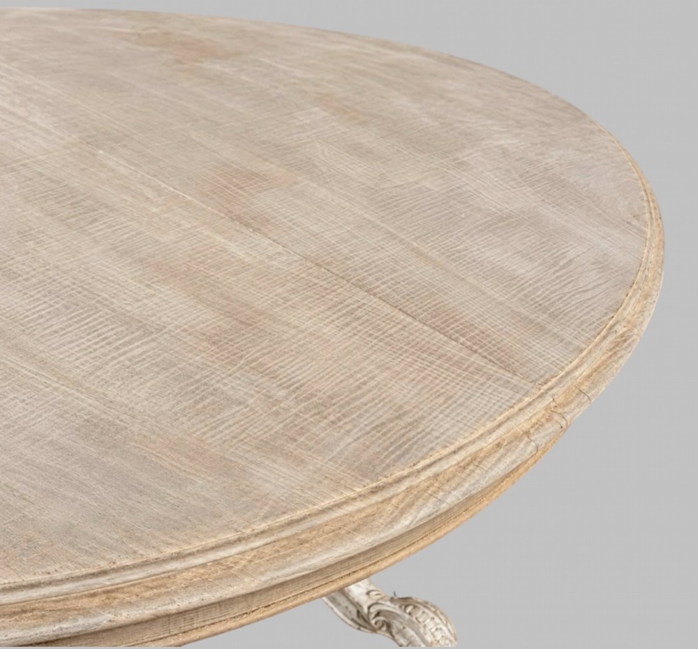 A circular mid-19th-century centre table featuring a bleached mahogany top supported by a carved tripod pedestal base. View II