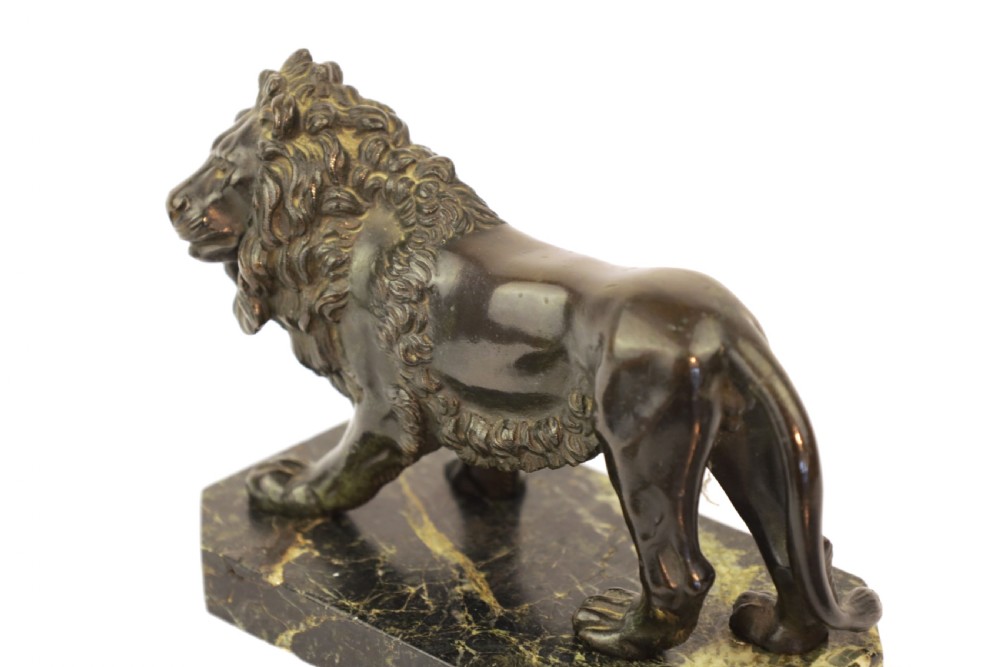 A 19th Century Bronze Sculpture of a Lion View IV