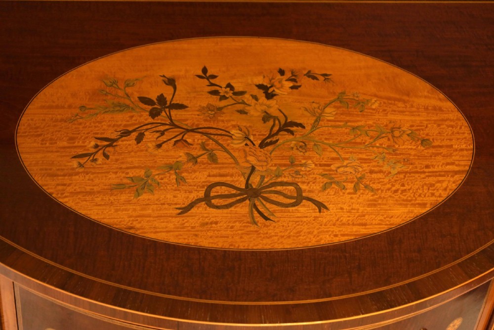 A Quality Victorian Mahogany Inlaid Serpentine Commode by Edwards and Roberts View II