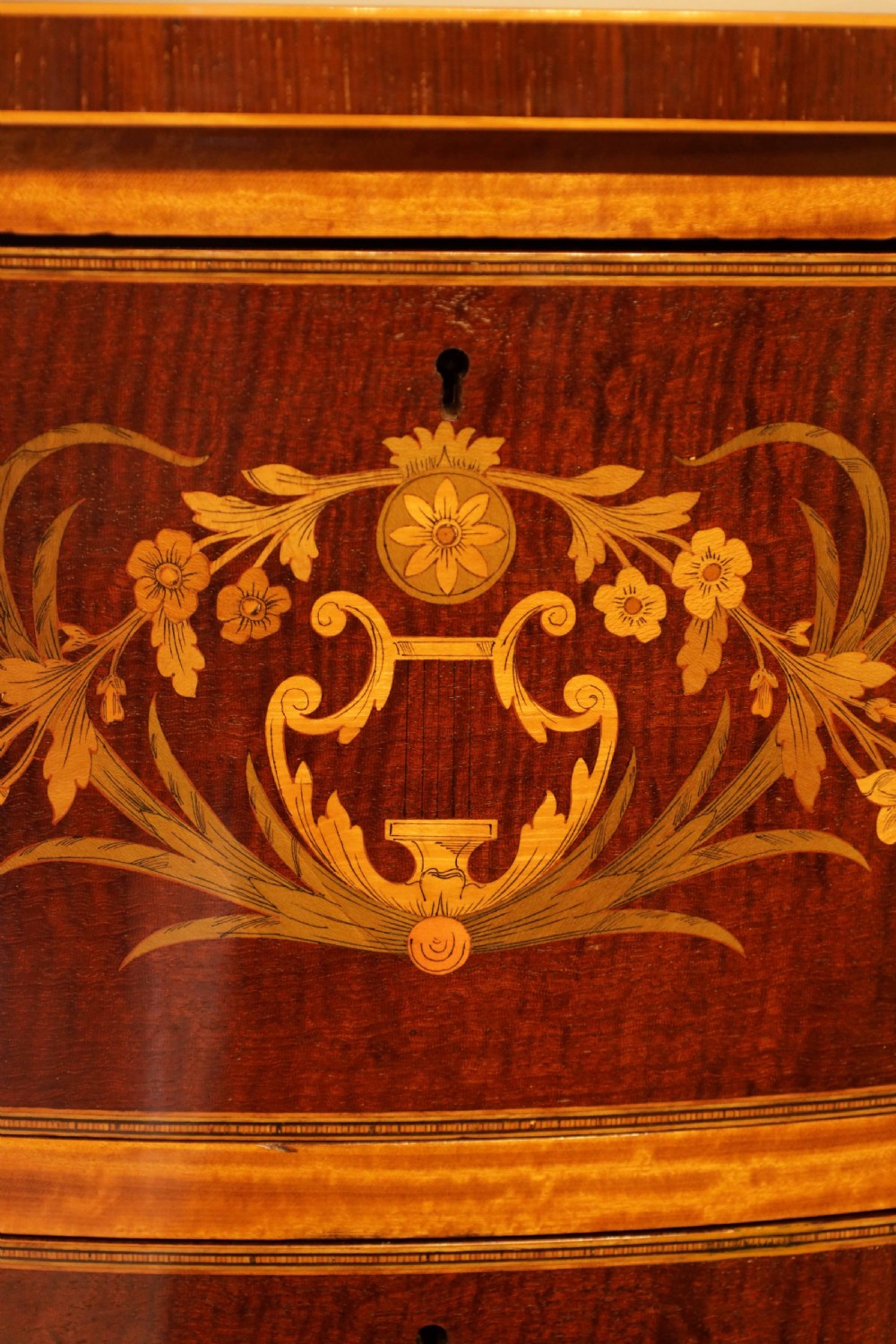 A Quality Victorian Mahogany Inlaid Serpentine Commode by Edwards and Roberts View V