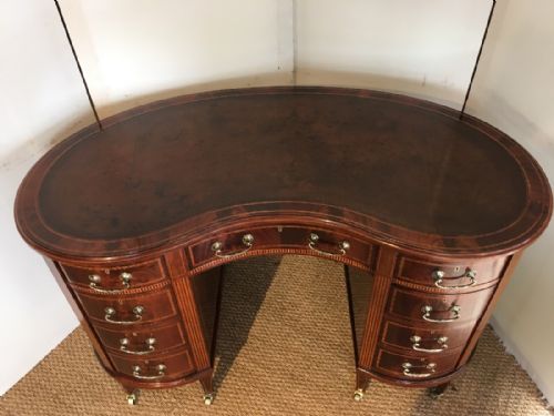 fig 1. Edwardian mahogany kidney shaped desk