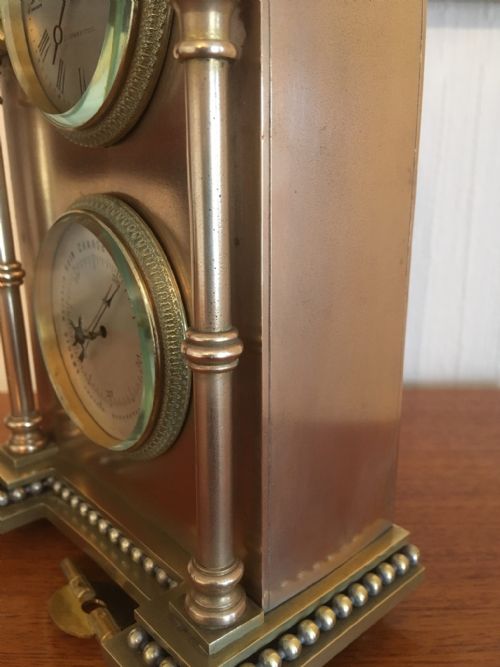 fig 2. BRASS AND COPPER CASED GOTHIC MANTEL CLOCK