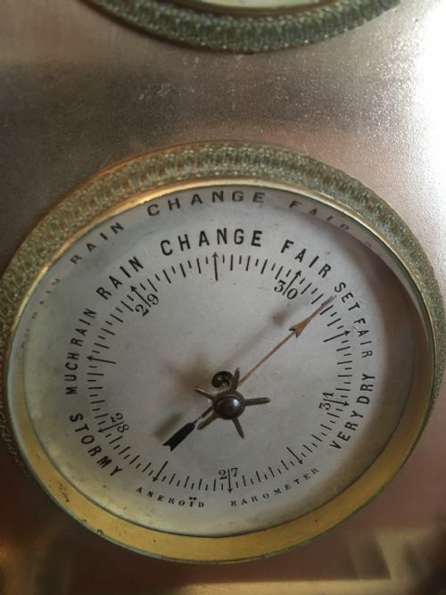 fig 3. BRASS AND COPPER CASED GOTHIC MANTEL CLOCK