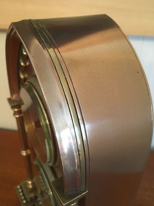 fig 5. BRASS AND COPPER CASED GOTHIC MANTEL CLOCK