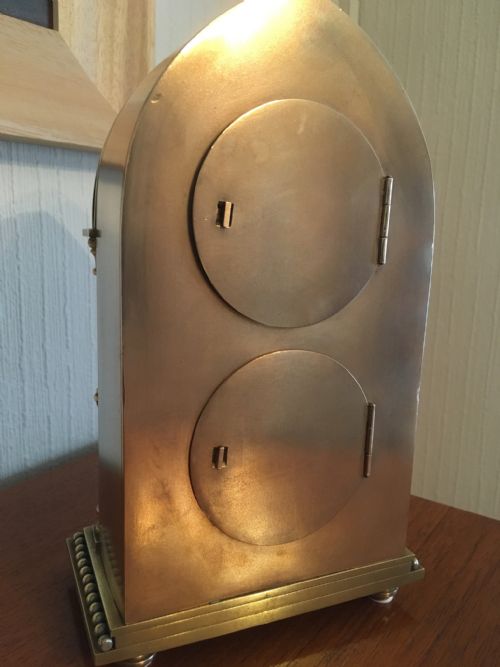 fig 6. BRASS AND COPPER CASED GOTHIC MANTEL CLOCK