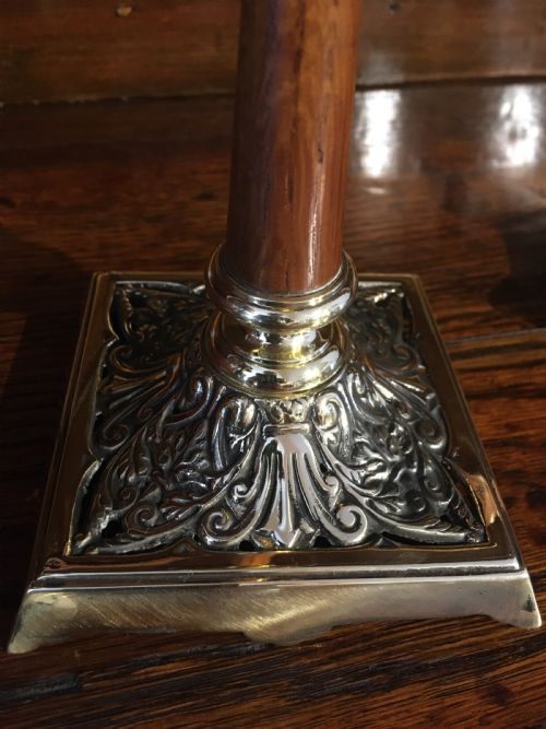 fig 4. PAIR OF BRASS AND WOOD CANDLESTICKS