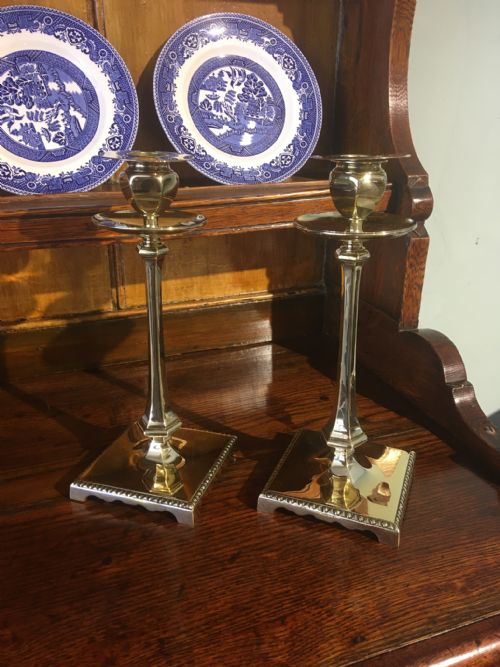Pair of Brass Candlesticks by William Tonks