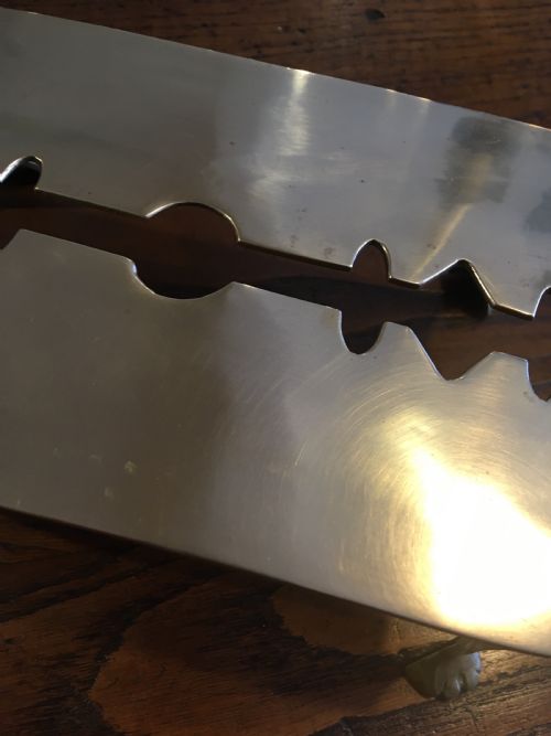 fig 3. BRASS “RAZOR BLADE” TRIVET