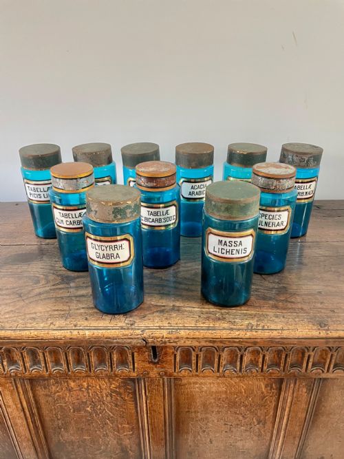 Collection of 11 Blue Glass Apothecary Bottles