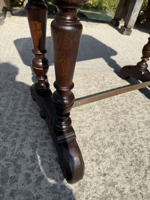 A 19th-century French table a gibier featuring a red and grey veined marble top resting on a dark turned timber base with a low stretcher. View VII