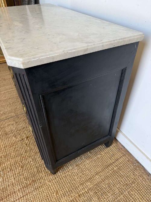 A 19th-century French three-drawer chest of drawers painted black with a white marble top and brass ring handles. View III