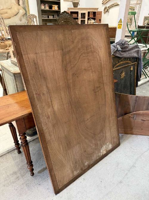 A large rectangular mahogany wall mirror featuring a moulded timber frame and a carved ormolu foliate cresting at the top. View VIII