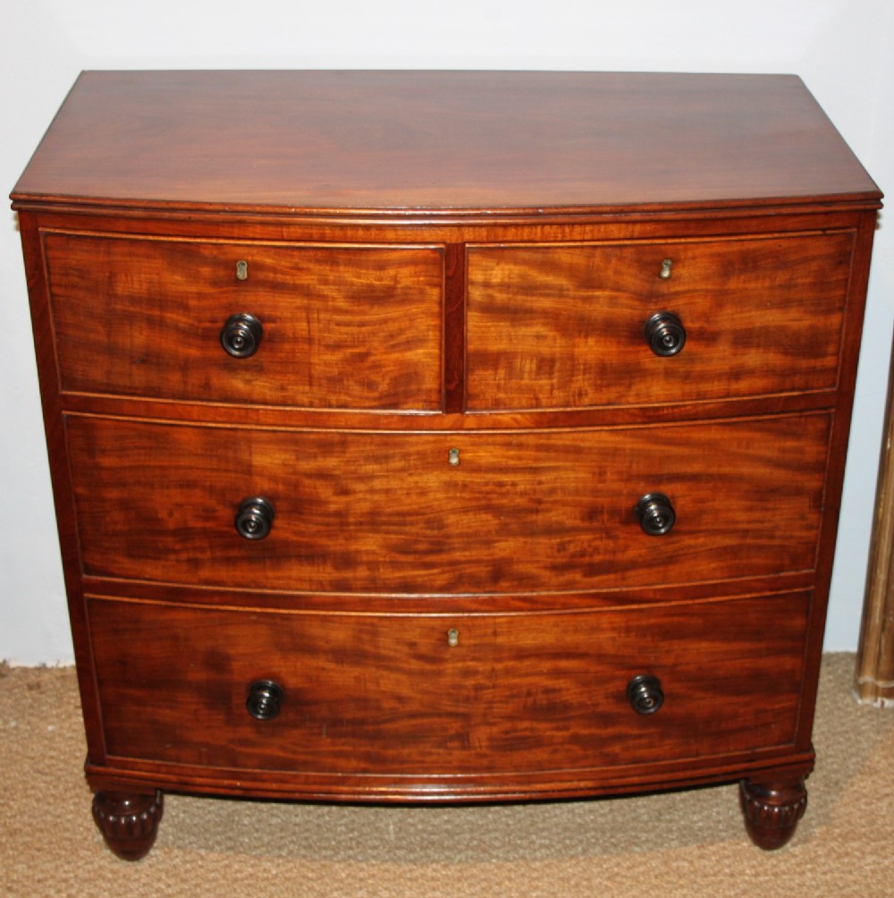Small bow fronted mahogany chest of drawers 