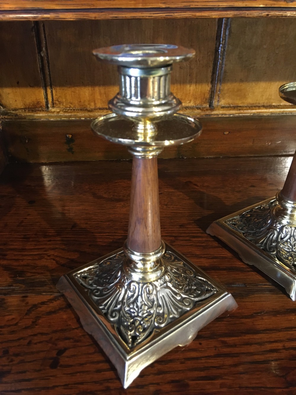 PAIR OF BRASS AND WOOD CANDLESTICKS  View II
