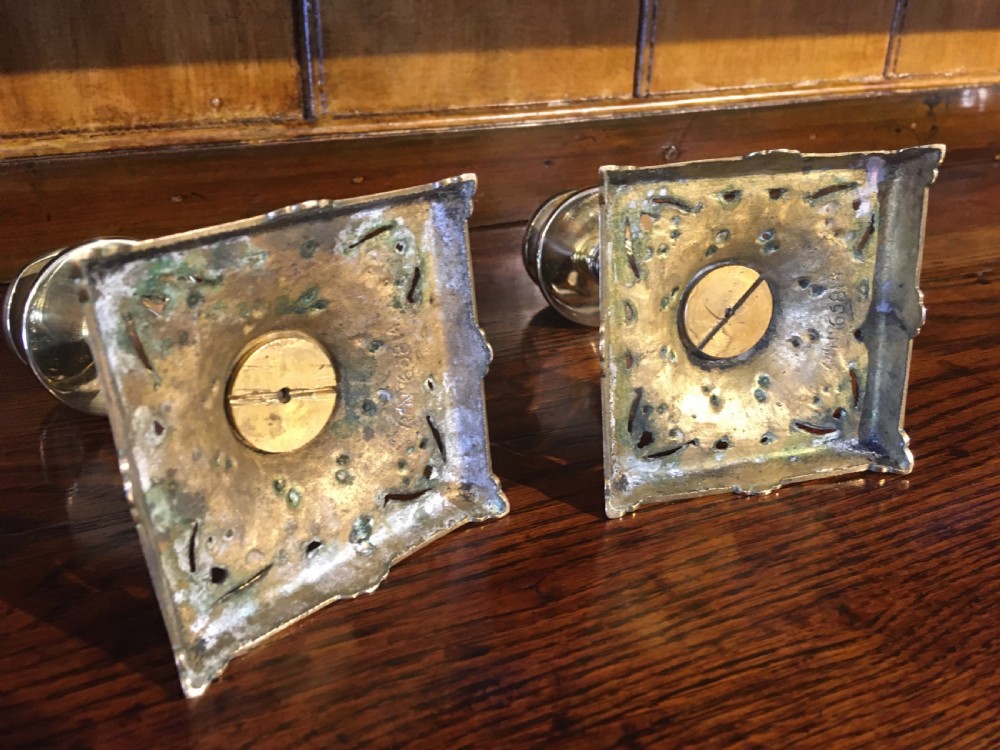 PAIR OF BRASS AND WOOD CANDLESTICKS  View VIII