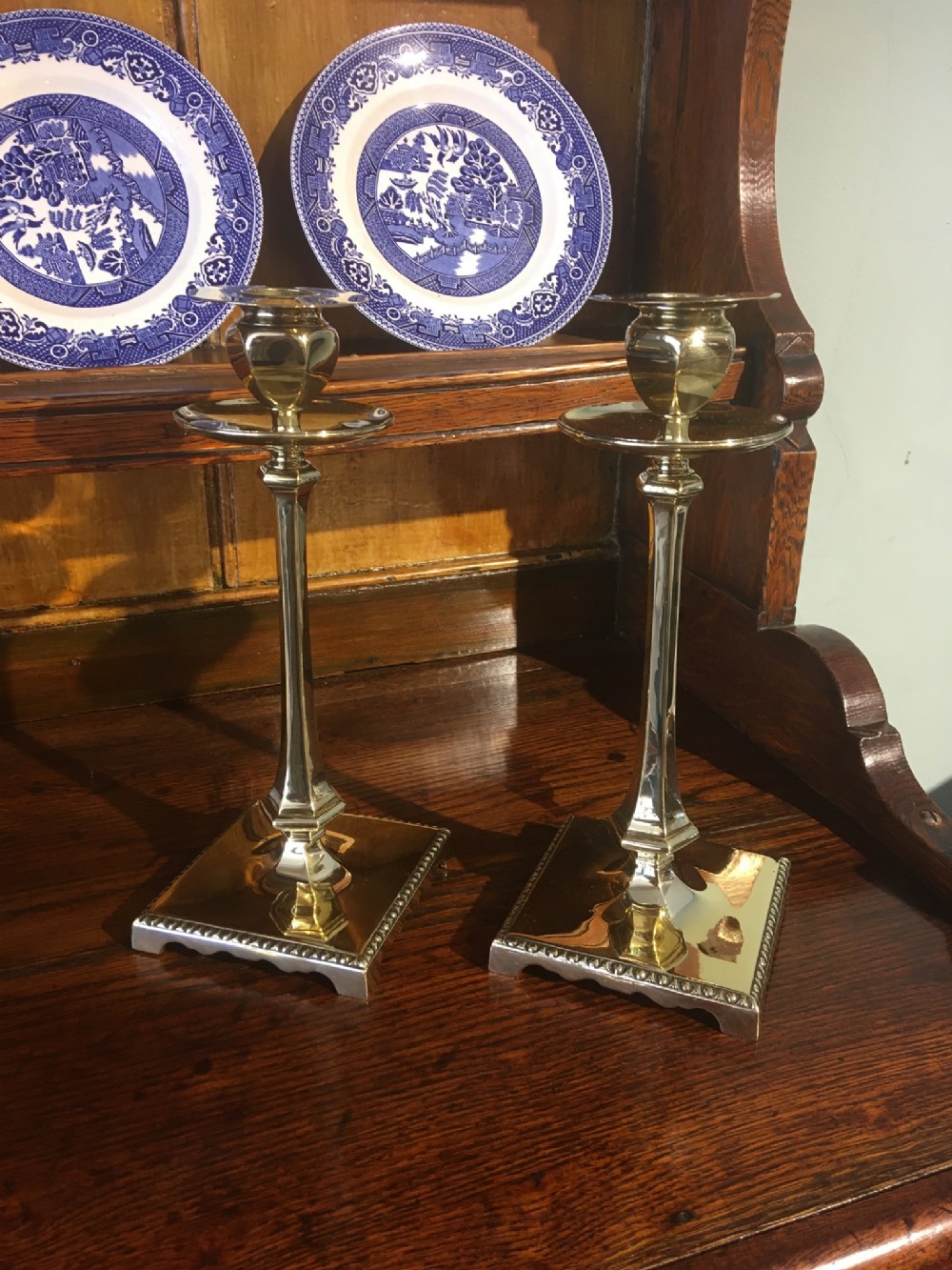 PAIR OF BRASS CANDLESTICKS BY WILLIAM TONKS 