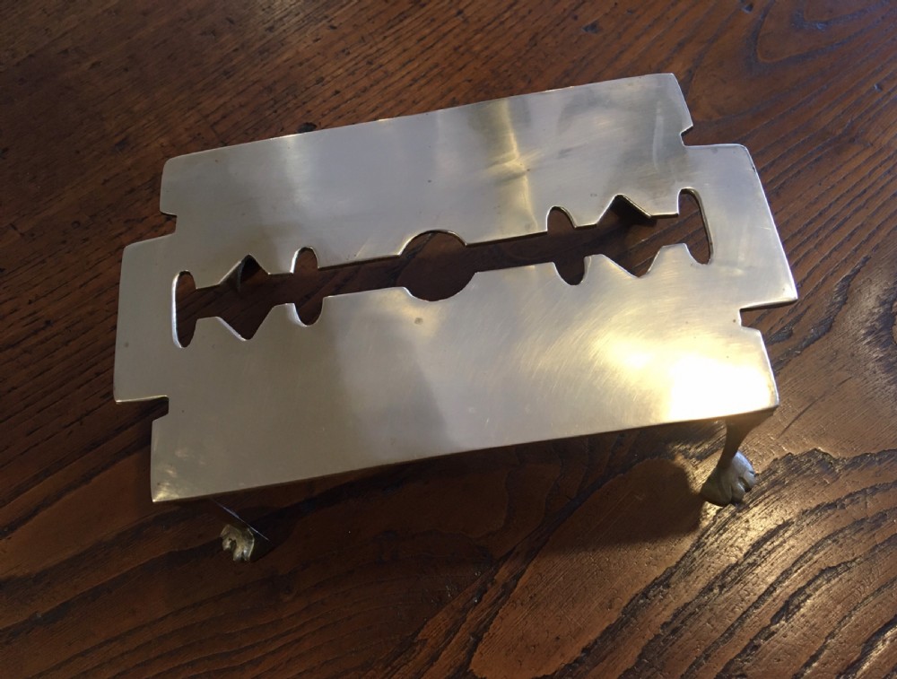 BRASS “RAZOR BLADE” TRIVET