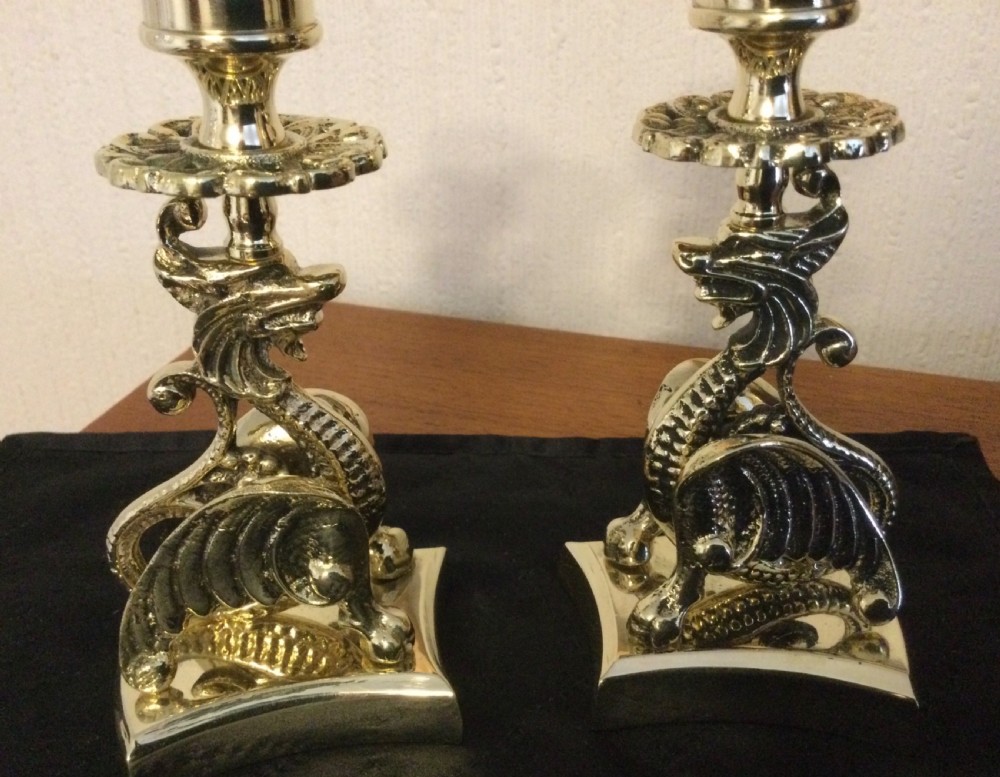 PAIR BRASS GRIFFIN CANDLESTICKS  View IV