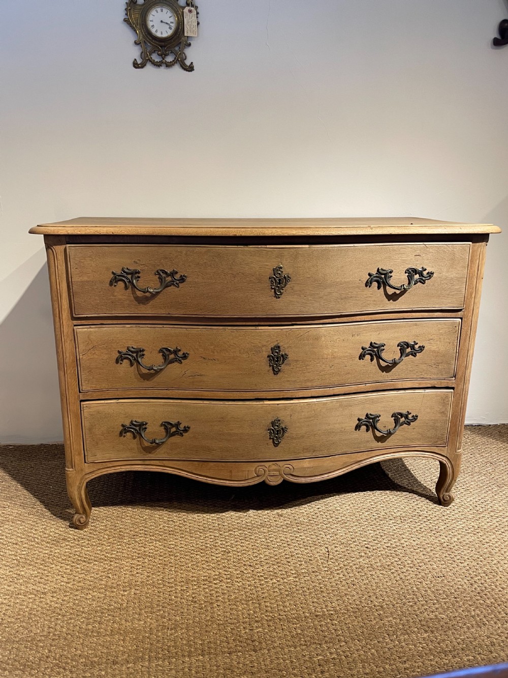 Washed oak serpentine fronted French commode 