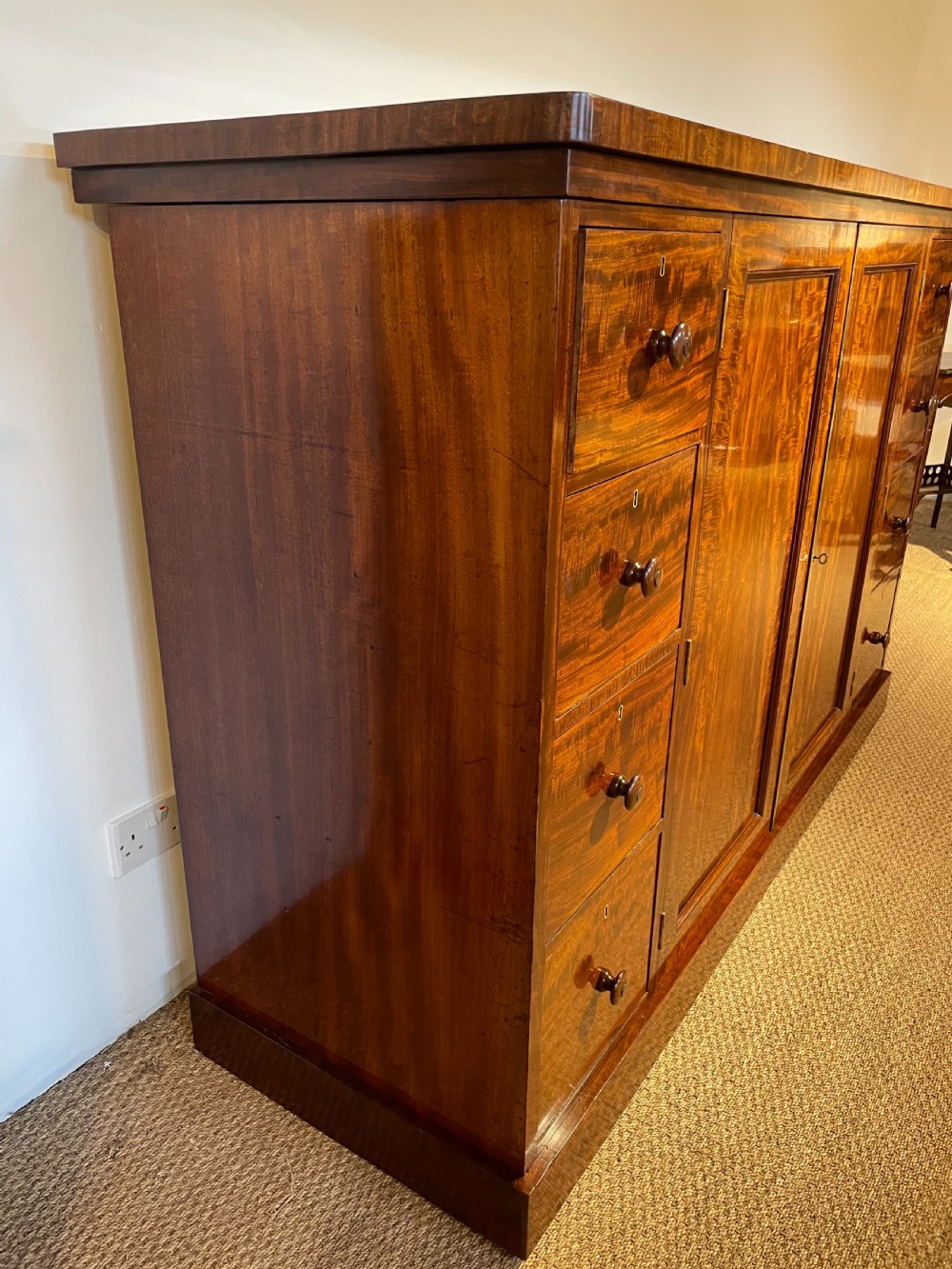 Low wide mahogany linen press  View III