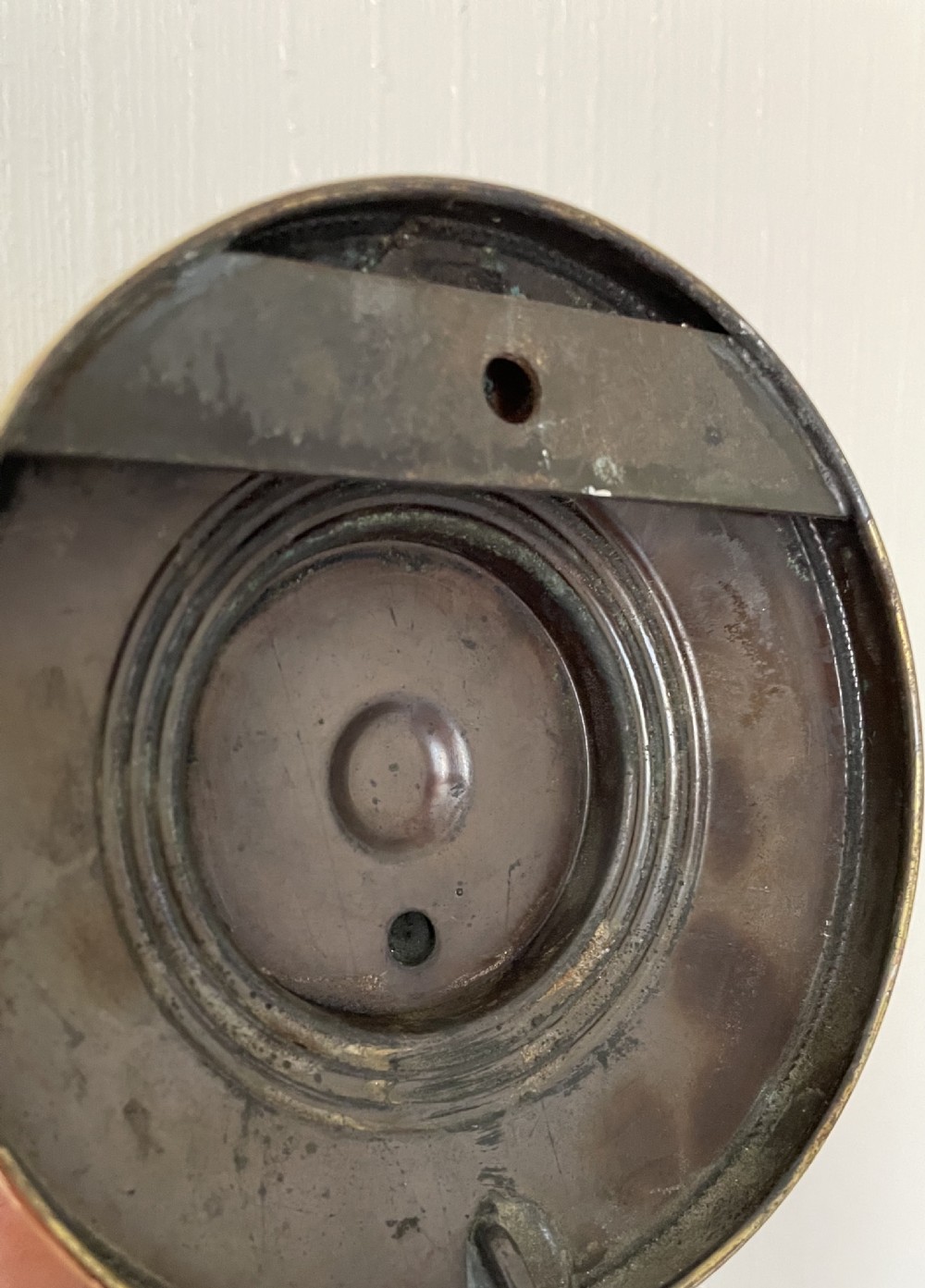 WALL MOUNTED GONG HELD IN DOG’S MOUTH View III