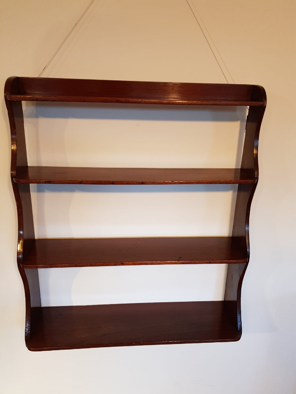VICTORIAN MAHOGANY “WATERFALL” HANGING SHELVES 