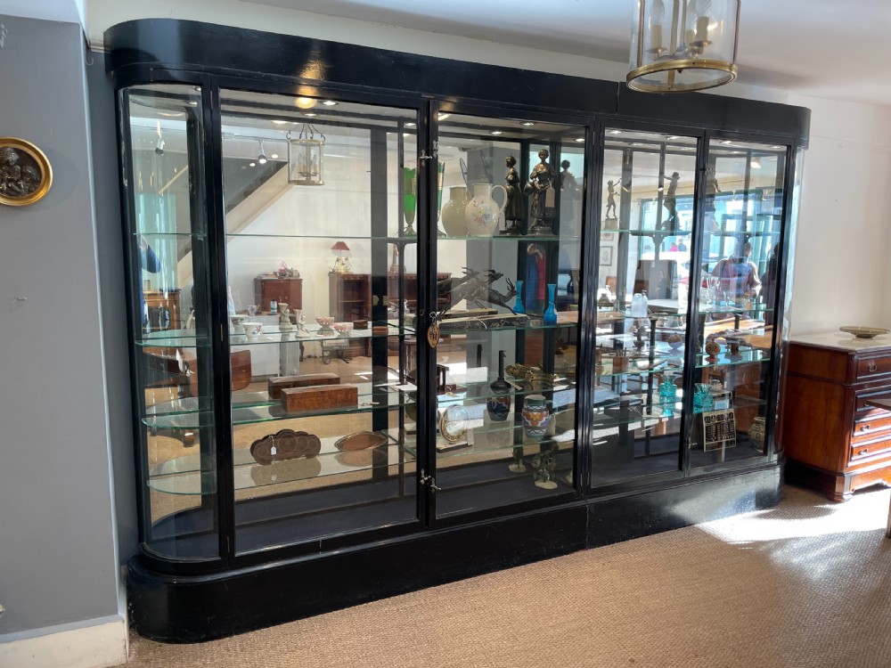 Large Victorian ebonised shop display cabinet 