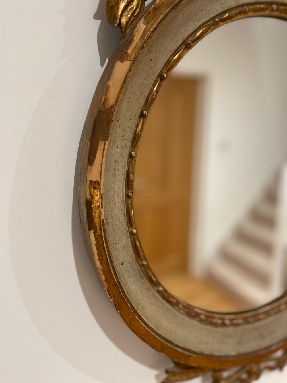 Round mirror with torch and quiver cresting  View III
