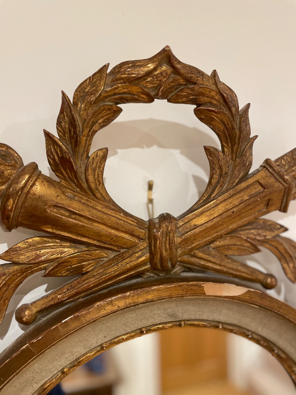 Round mirror with torch and quiver cresting  View IV