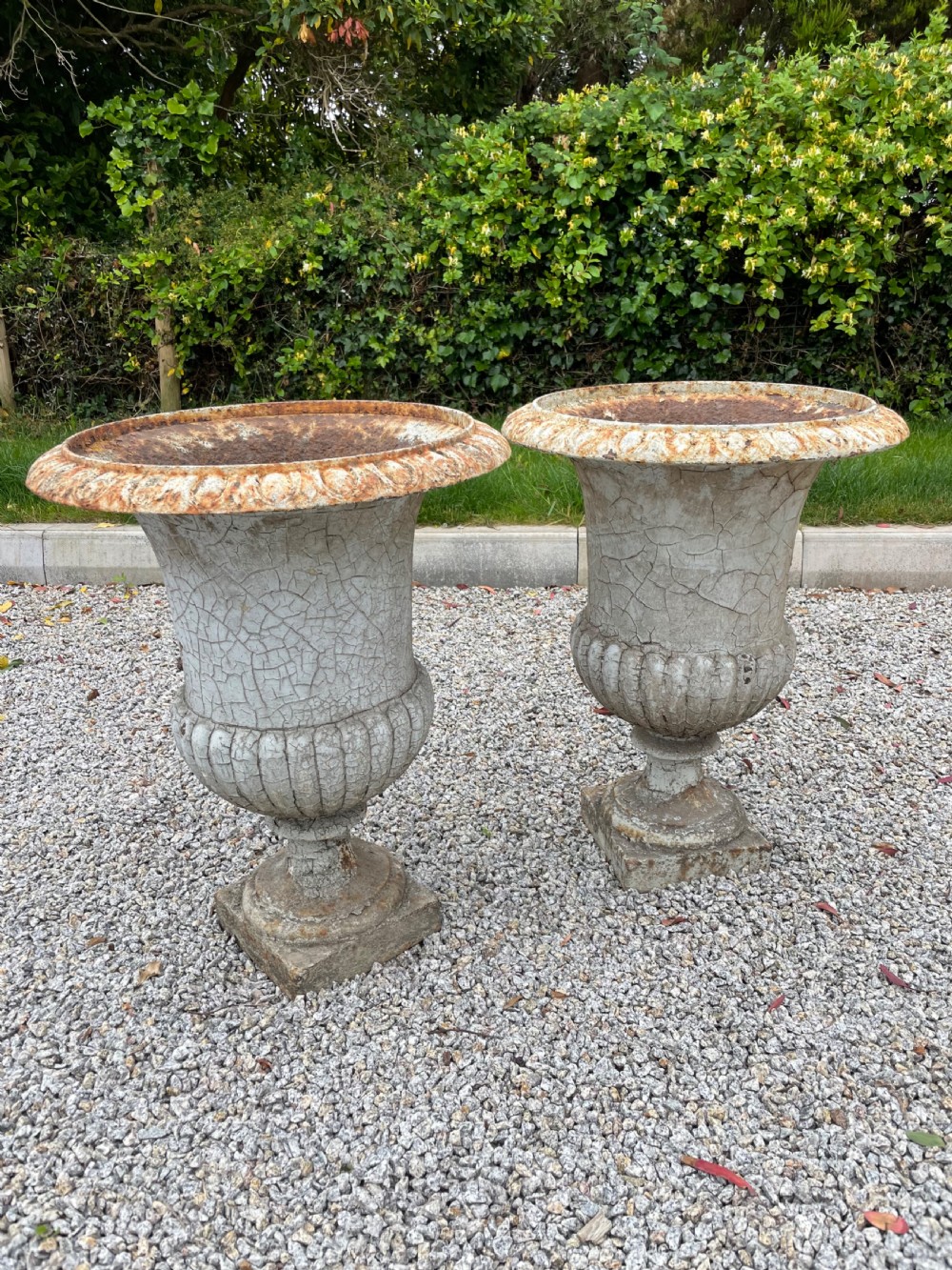 Large pair of Victorian cast iron urns 