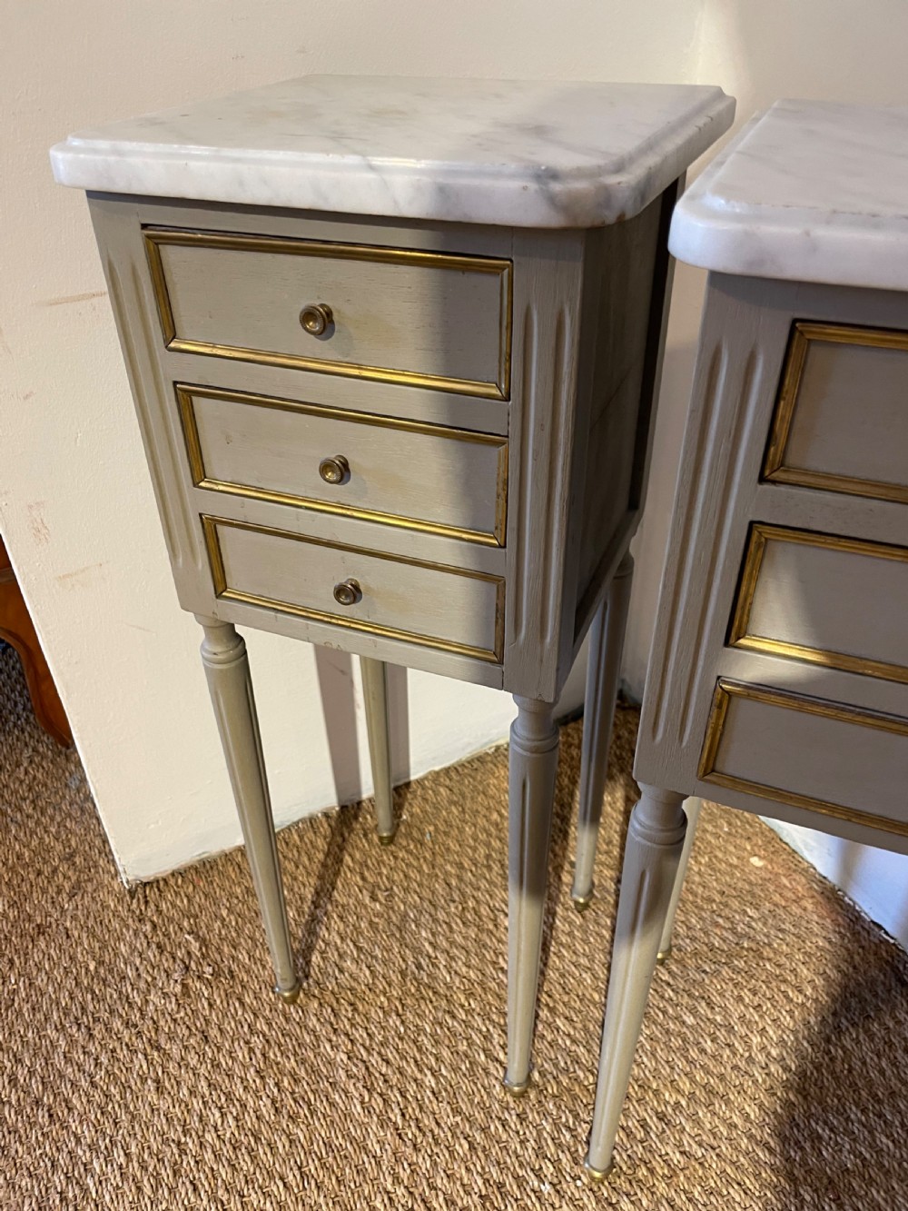 Very neat sized pair of marble topped bedside cabinets  View II