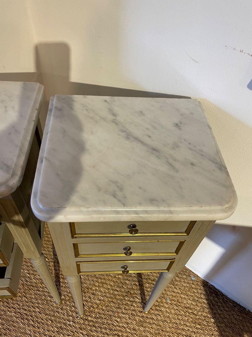 Very neat sized pair of marble topped bedside cabinets  View IV