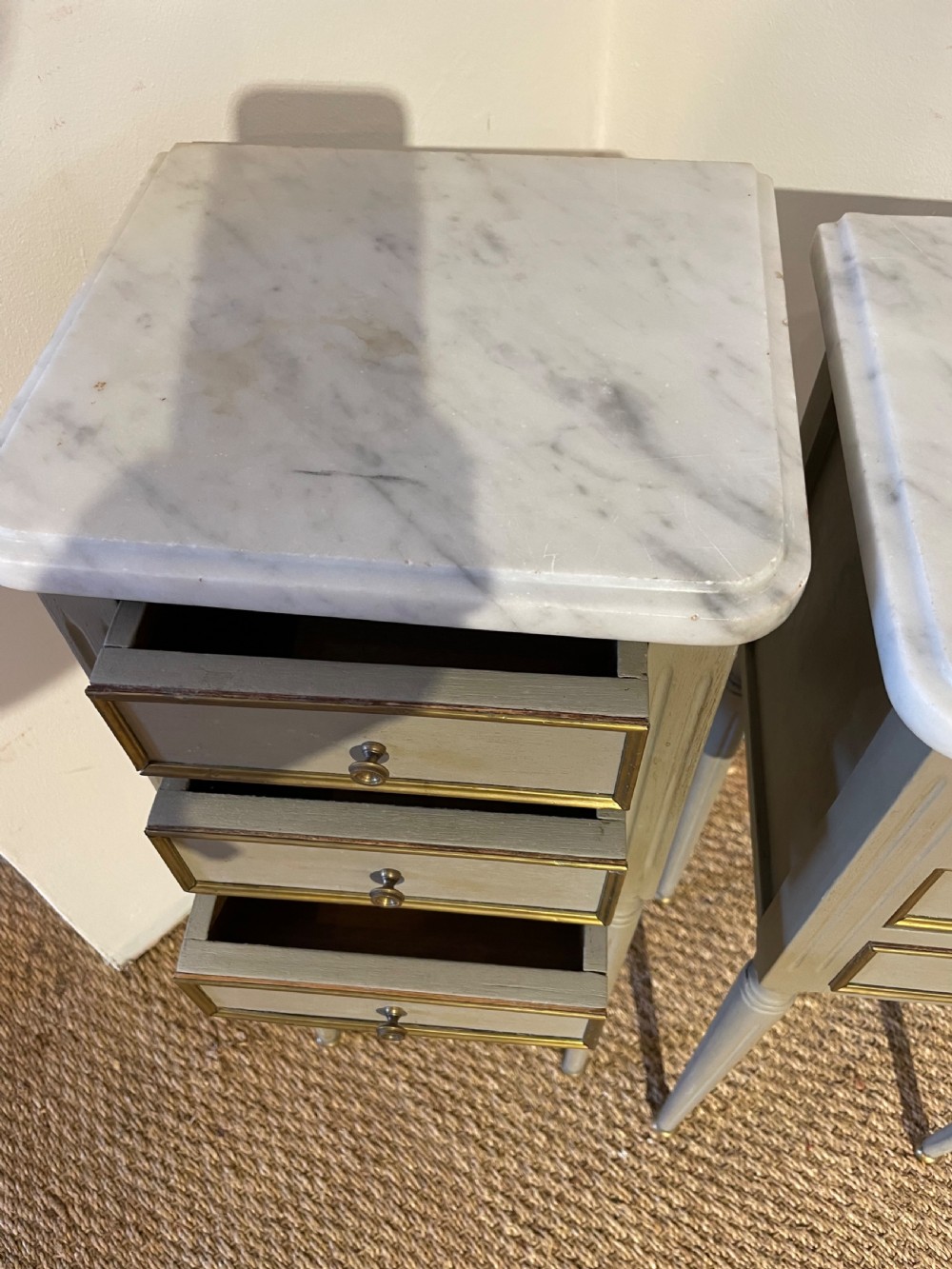 Very neat sized pair of marble topped bedside cabinets  View VI