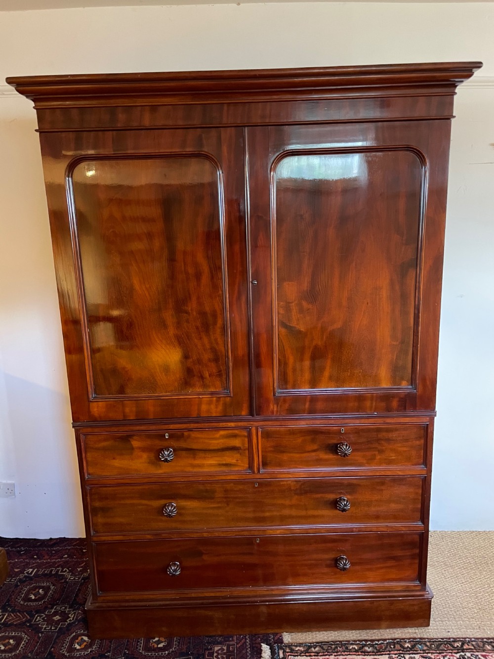 Victorian flame mahogany linen press 