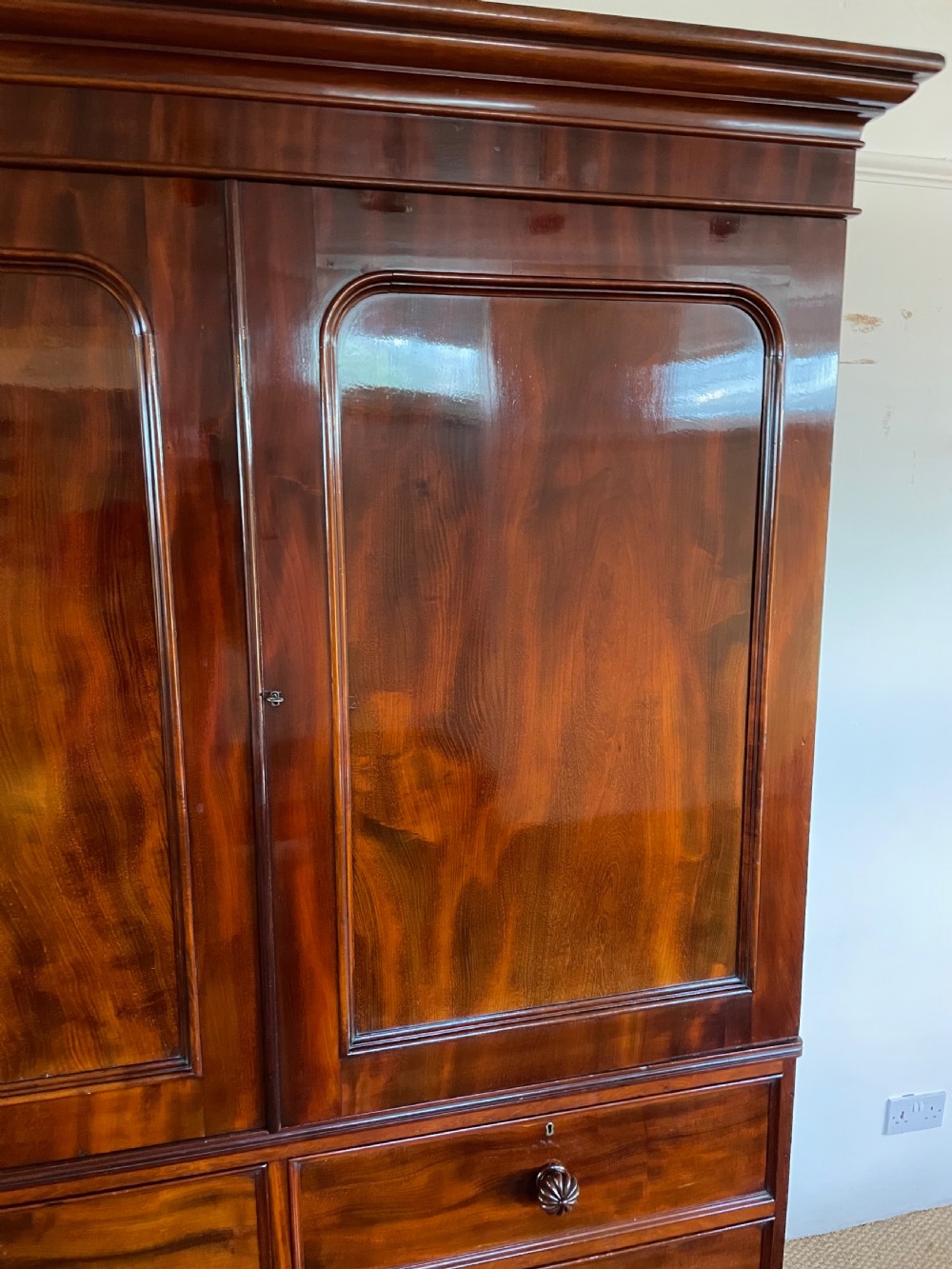 Victorian flame mahogany linen press  View II