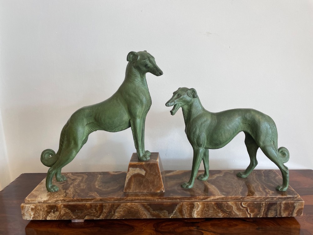 Art Deco spelter borzoi mounted on marble bas Le 