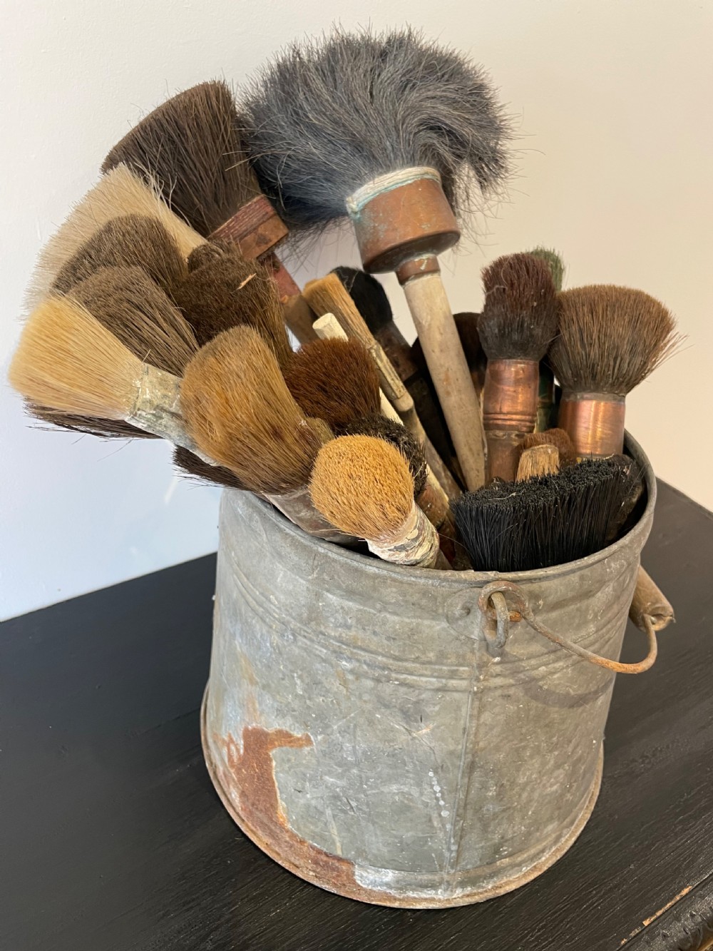 Collection of  paint brushes ina zinc bucket  View III