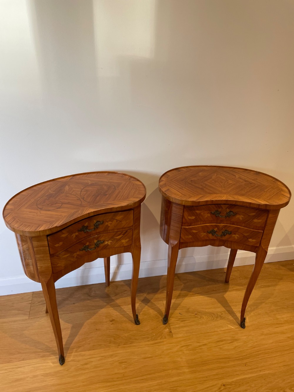 Pair of kidney shaped bedside cabinets 