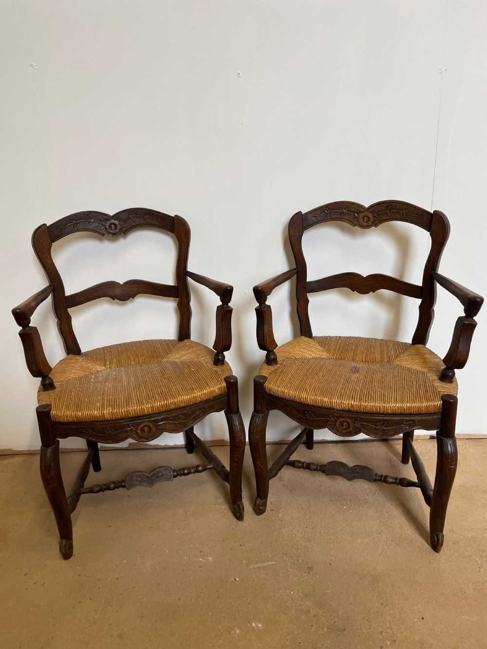Pair of country oak carver chairs 