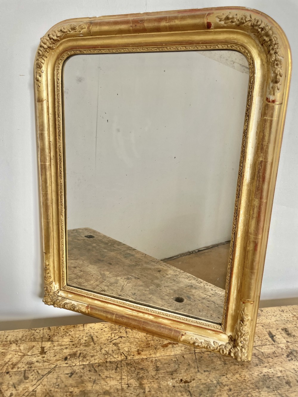 Small arched topped gilt mirror 