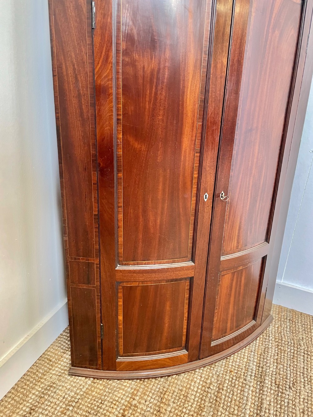 Georgian mahogany bow fronted corner cupboard  View II