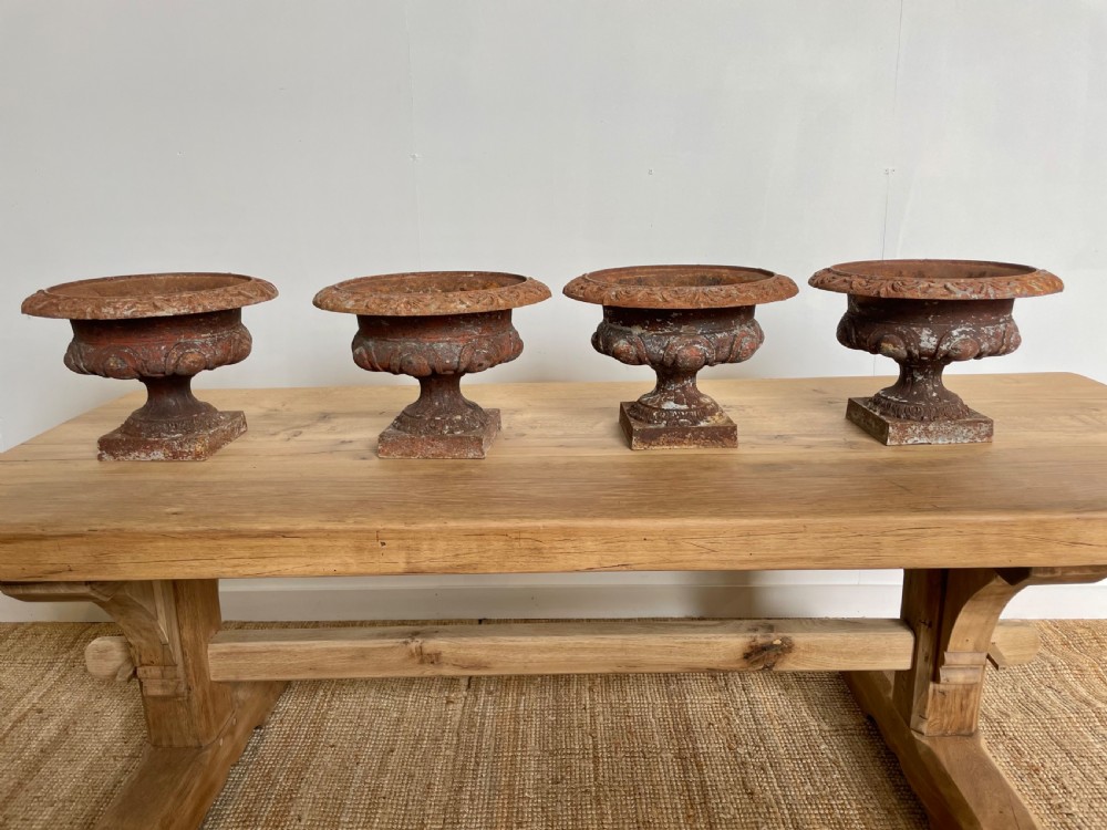 Set of 4 cast iron planters 