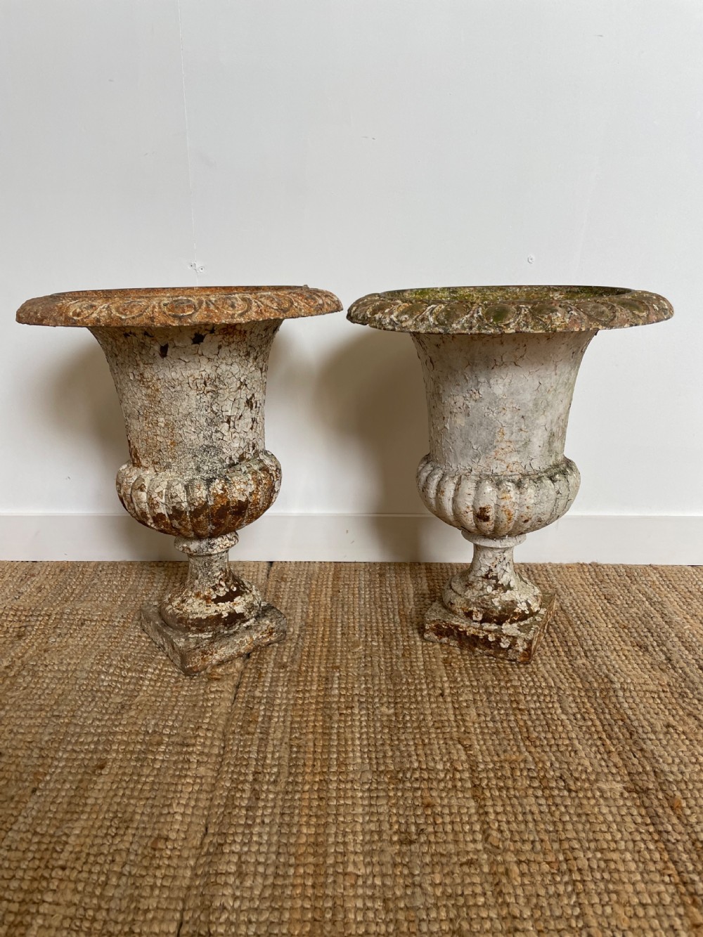 Pair of cast iron garden urns 